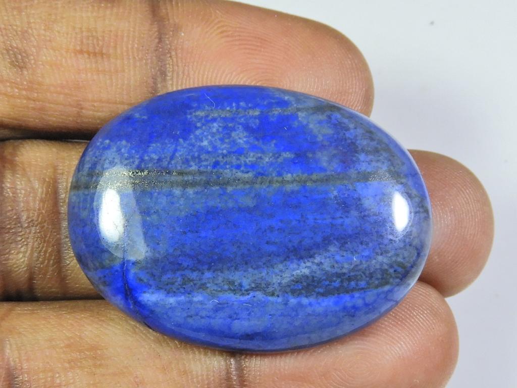 Натуральный голубой лазурит овальный кабошон россыпью драгоценный камень 75 карат. 28X38X07 ММ ET-119