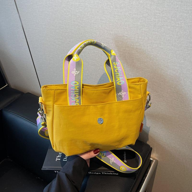 Large-capacity bag women's summer new versatile broadband messenger bag casual high-end portable tote bag