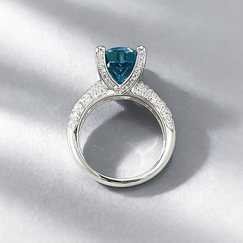 Xiancan Jewelry Серебряное кольцо S925 Овальное с огранкой 'Ледяной цветок' Paraiba с бриллиантом высокой твердости.