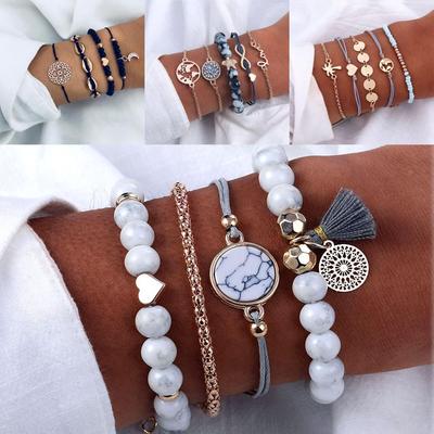 Комплект браслетов из разных материалов Стиль-бохо