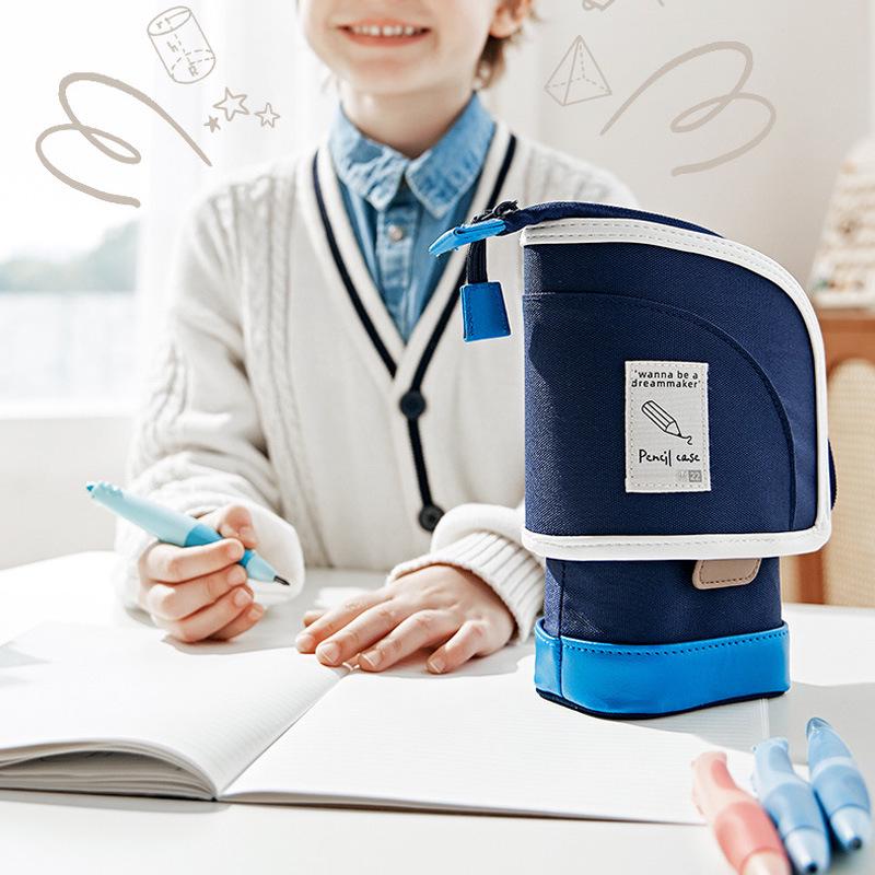 Вместительный выдвижной пенал-подставка для учеников начальной школы