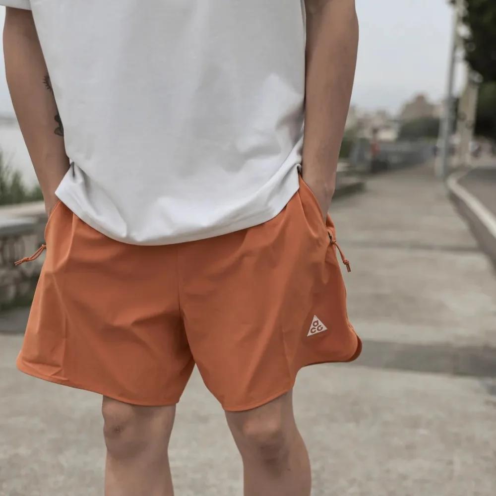 Nike Sports Shorts Men's Orange Moderate (Unisex) Sports Shorts DN3956 815