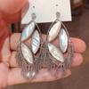 Light Luxury High-end Sense Retro Court Style Fritillary Fringed Earrings Niche Unique Design Exquisite Personality Atmospheric Earrings