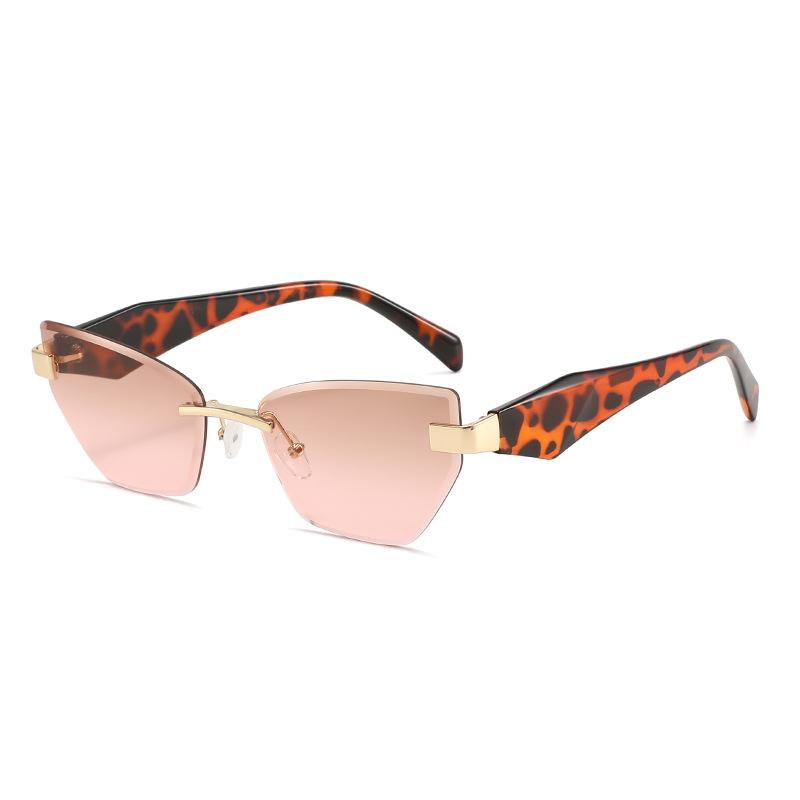 New irregular European and American sunglasses women's tide frameless sunshade outdoor travel street cat eye sunglasses