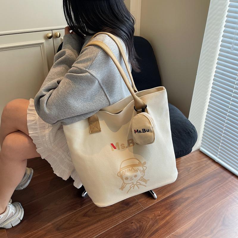 Large-capacity Commuter Tote Bag Women's 2025 Summer New Fashion Simple Canvas Bag Lazy Wind Shoulder Armpit Bag