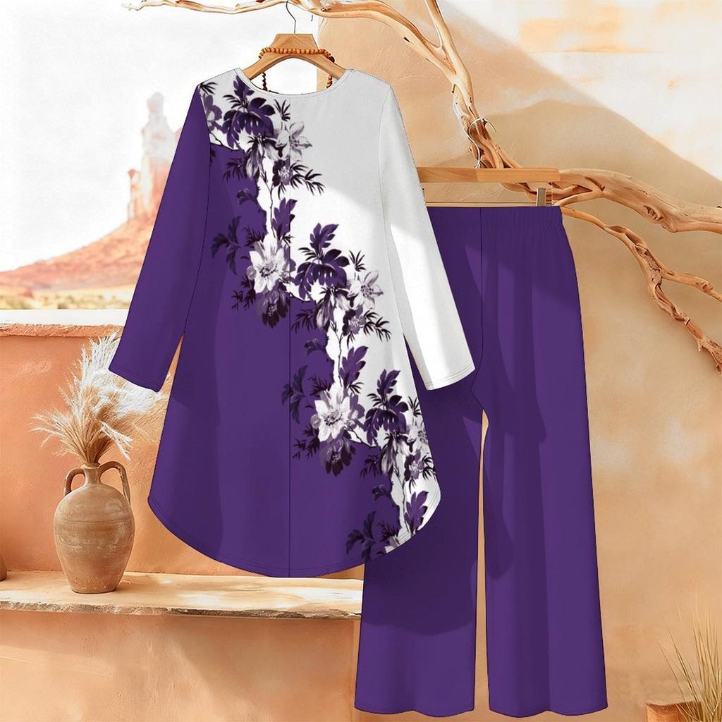 Женский комплект из двух предметов с цветочным принтом: туника с длинными рукавами и асимметричным низом, широкие брюки. Повседневный комплект.