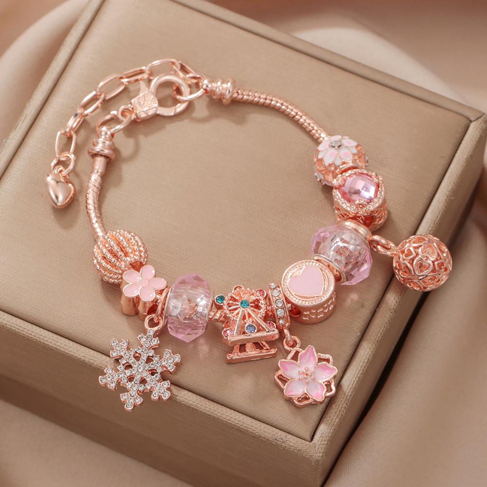 Роскошный браслет из бисера цвета розового золота с сакурой и снежинкой - подарок на День святого Валентина