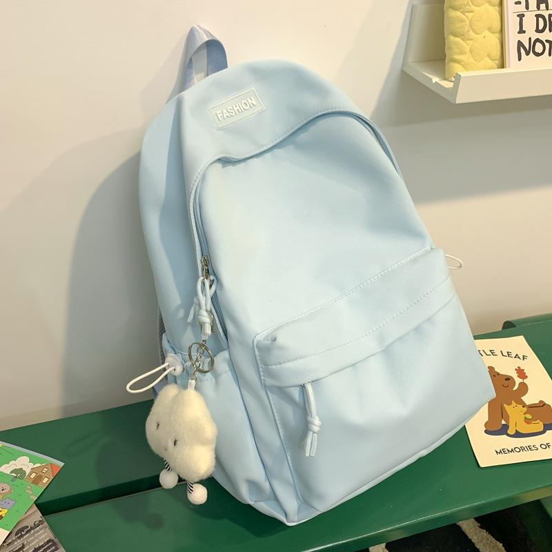 The Schoolbag Is Fresh and Sweet, and the Solid Color Is Versatile and Simple. The Schoolbag for Junior High School Students Is Light
