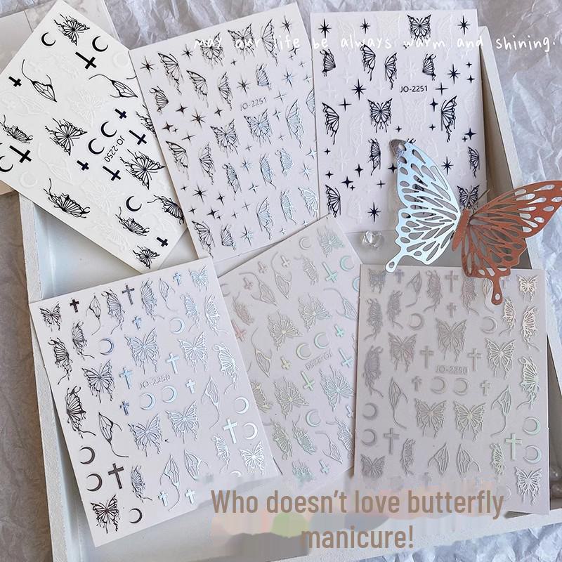 Xiaohongshu DIY лазерные наклейки для ногтей, расписанные вручную: Черные, белые, золотые и серебряные крылья бабочки с клейкой основой.