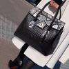 New Contrasting Snake Pattern Women's Handbag 2024 High End Weaving Pattern Cowhide Commuter Bag