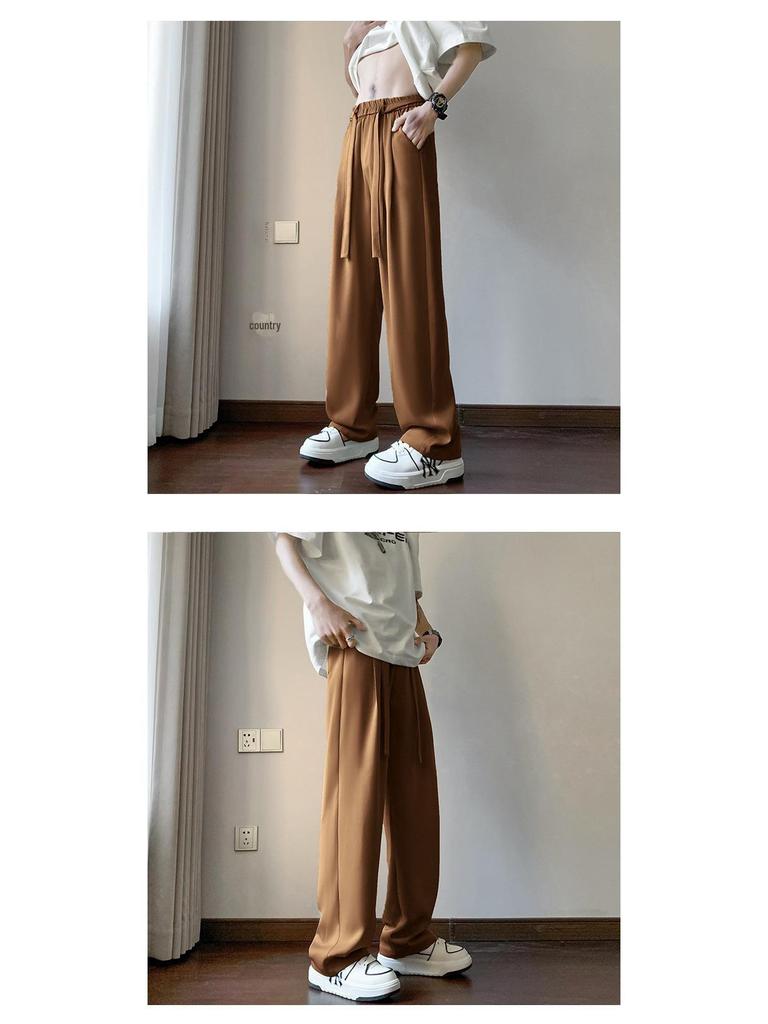 Брюки из итальянского драпированного ледяного шелка в стиле британских яппи с завязками