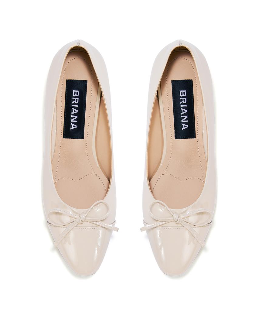 Briana The Ribbon Flat [Cream Patent]
