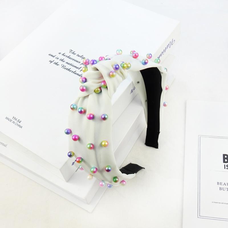 Весна и лето цветной жемчужный узел давление повязка на голову мода уличный снимок широкий край девушка тренд повязка на голову