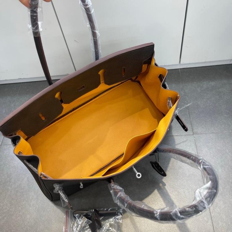 Cross-border trend bag short version oversized portable shoulder bag TOGO first layer cowhide large capacity giant pack