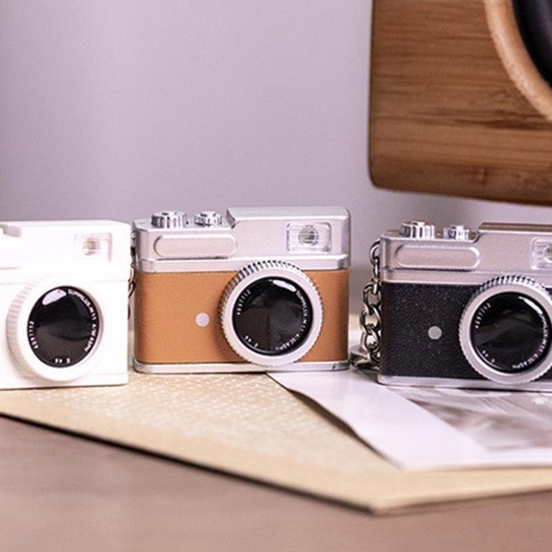 Креативный дизайн Мини-зеркальная камера Светящийся брелок Включает светозвуковой эффект для стильных подарков и вечеринок Личное использование