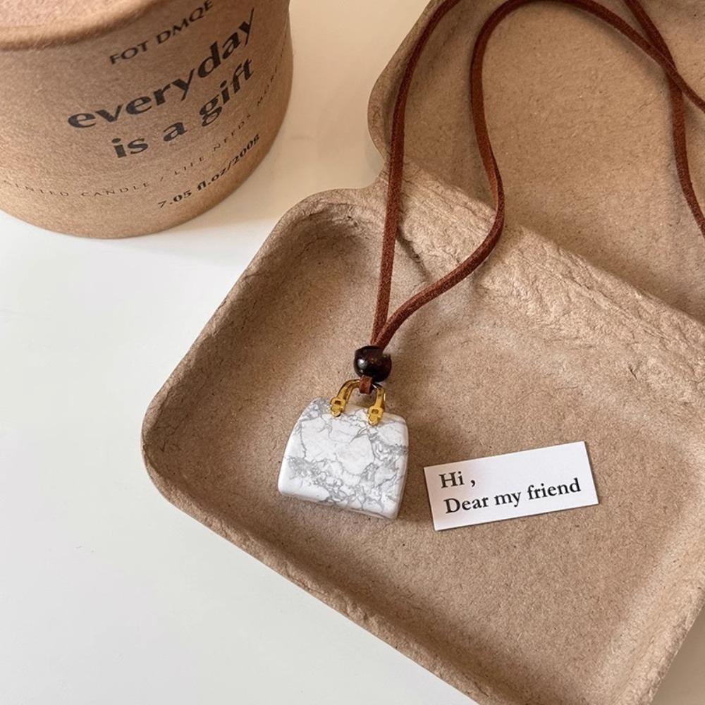 Ожерелье из сплава с сумкой, коричневое кожаное ожерелье из свитера с веревкой, креативный дизайн сумки, кулон для женщин