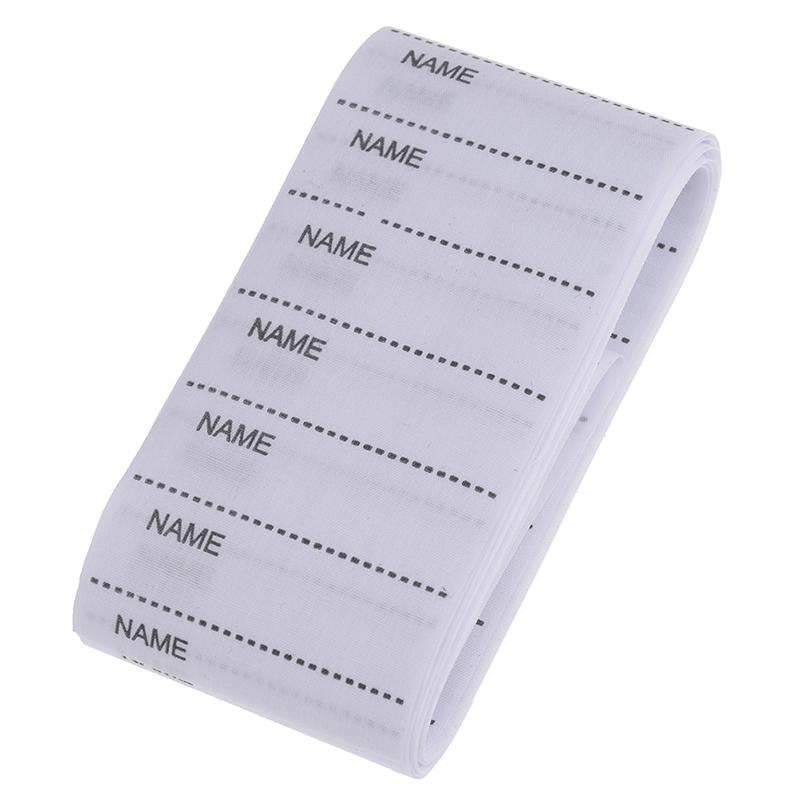 Белый моющийся утюг на наборе маркеров бирок ткани одежды ярлыков имени для одежды