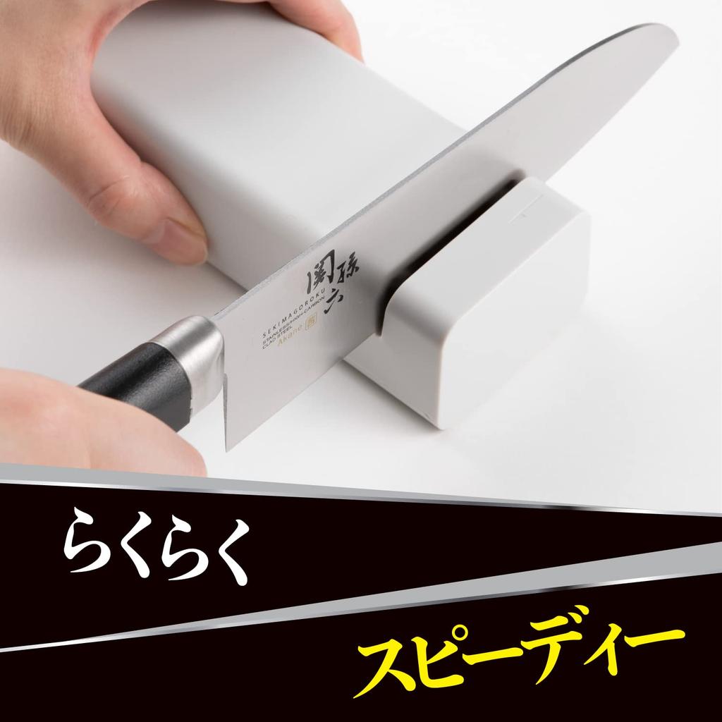 Kai AP0543 Компактная электрическая точилка для ножей с автоматическим точильным камнем