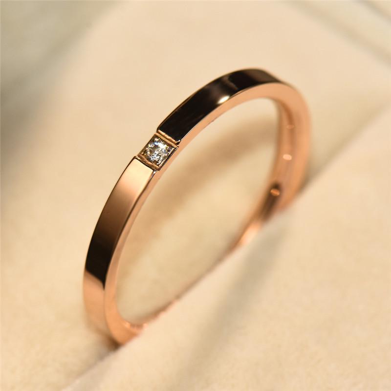 Медное кольцо со стеклянным камнем в цветах: серебро / розовое золото