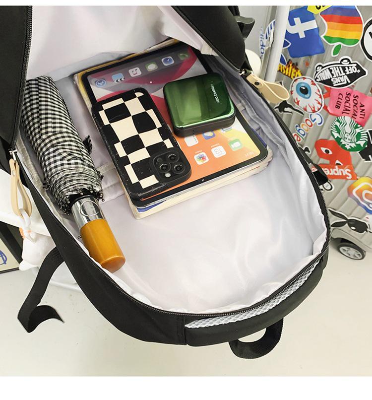 Fashionable Water-Repellent Student Backpack: Trendy High-Capacity Design for Couples