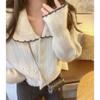 Autumn and Winter Solid Color Loose Lazy Wind Knitted Cardigan Top Women's Sweet Doll Collar Sweater Jacket Splicing