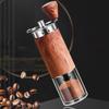 Portable, compact, hand-held coffee grinder with ceramic mortar, 5-degree adjustable grinding angle, washable clear container, natural wood finish,