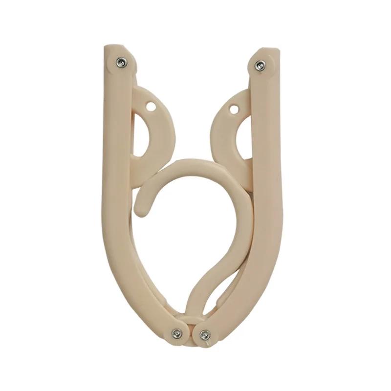 Новая дорожная портативная пластиковая вешалка Многофункциональная простая складная вешалка для дома Противоскользящая сушильная поддержка