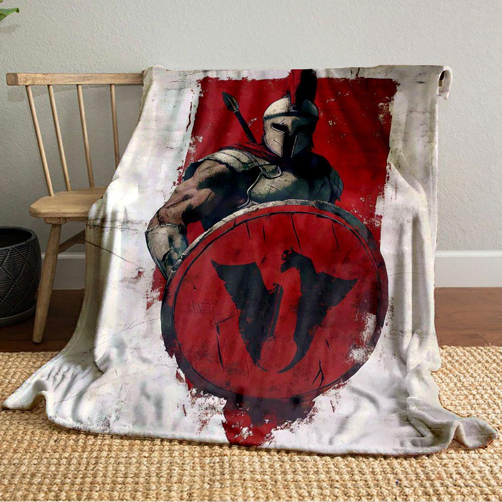 A Spartan warrior in armor holds a red shield with a black emblem. for all seasons blanket lunch break throw gift