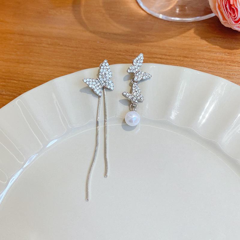Silver needle asymmetrical butterfly pearl fringed earrings women's high sense long super fairy Internet celebrity stud earrings ear jewelry