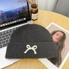 Red bow knitted hat women's versatile face small wool hat outdoor cold-proof and warm bag head cold hat