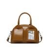 The Handbag Is Fashionable Simple and VersatileIt Is A Crossody Bag A Hand-held Boston Bag and A Small Square Bag