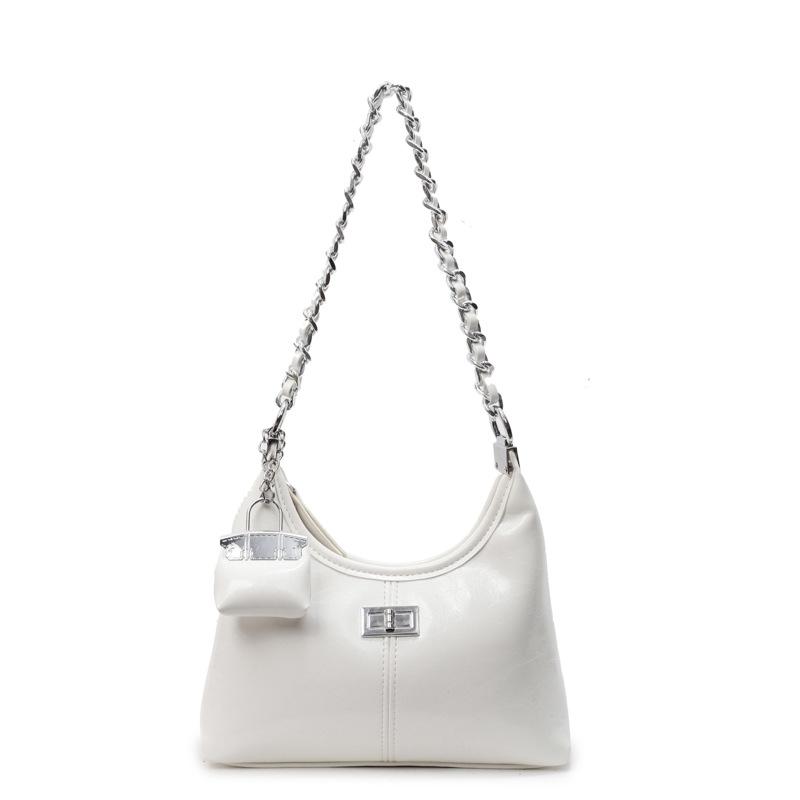 В этом году популярна корейская сумка-подмышка на цепочке из вощеной кожи люкс-класса, женственная, для работы, сдержанная, простая сумка-мессенджер