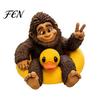 Whimsical Room Decoration Sasquatch And Duck Figurine, on Swimming Ring Statue, Decorative Figurine for Office Funny Animal Statue Home Tabletop Shelf