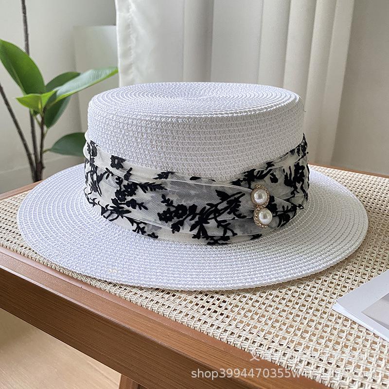 Summer new short brim flat top top top hat sunscreen sunshade sun hat British retro fashion straw hat woman