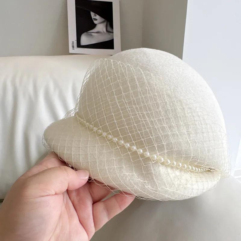 Хепберн Ветер после плиссированной шляпы рыбака Высококачественная австралийская шерстяная шляпа Модный французский сетчатый берет с жемчужной цепочкой