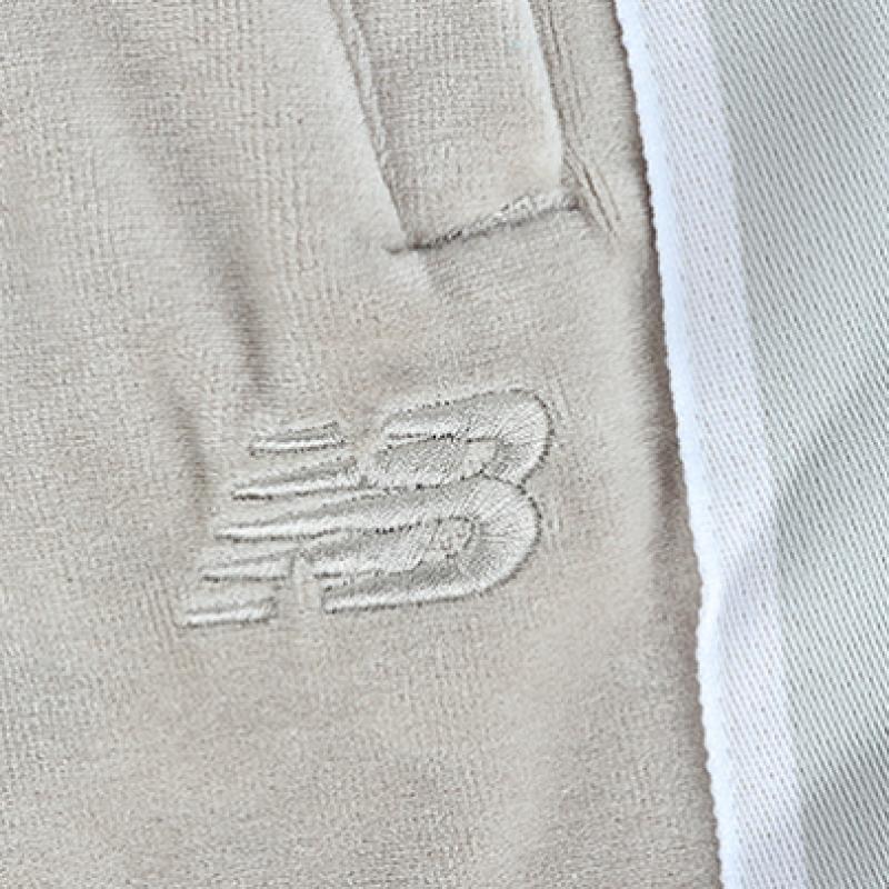New Balance Штаны универсальные велюровые N Track PNts Nbml934043 35 бежевый