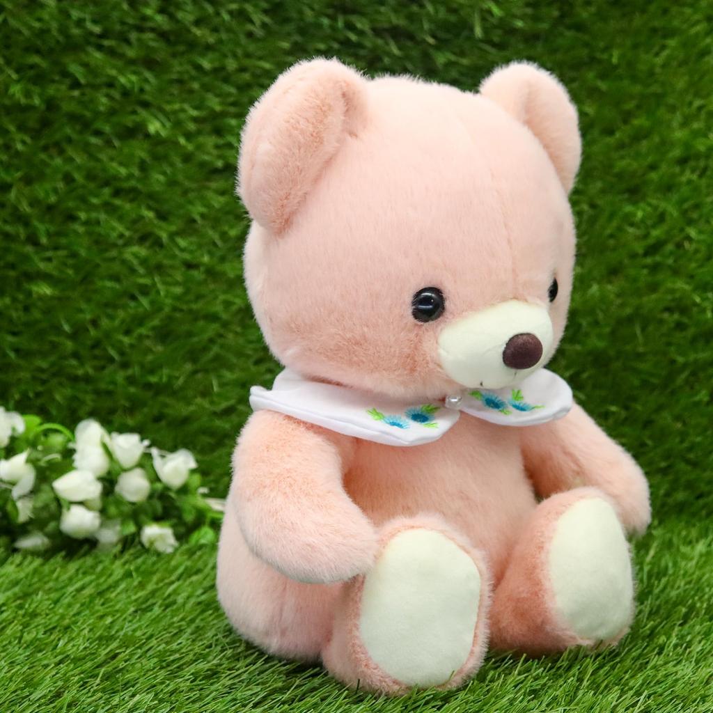 Take Off Bear Cub a retro bear with a cute floral embroidery on the Includes music Drop, pastel-colored collar. Medium, Pink. box.