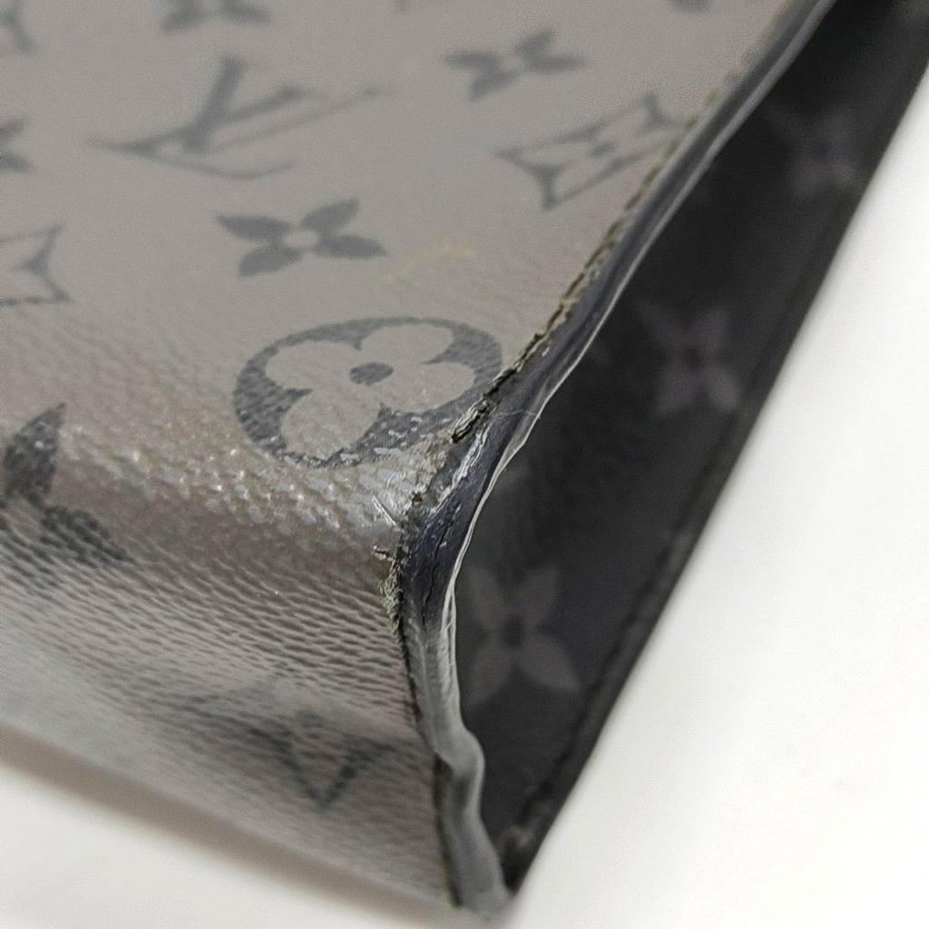 [Б/У] Pochette Voyage MM Классический холст с покрытием Monogram Кожа Taïga Косметичка Клатч Средний - Очень хорошее состояние #1FDGEI8