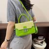 Vintage color-blocking texture lock buckle bag for women, new style for elegant commuting, handheld, shoulder crossbody, small square bag