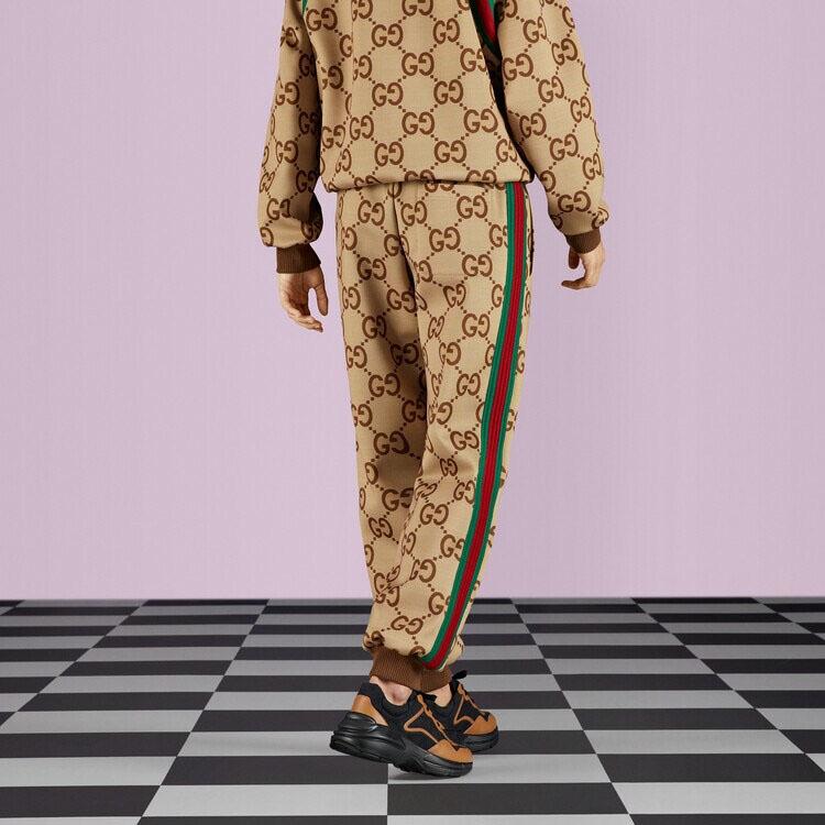 Gucci Спортивные брюки Jumbo GG с тесьмой 715192-XJETI-2270
