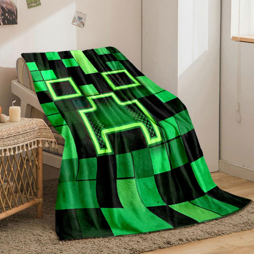 A pixelated green grid with a glowing, abstract face-shaped pattern. for all seasons blanket lunch break throw gift