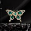 Vintage French Emerald Rhinestone Butterfly Brooch In Luxurious Retro Style
