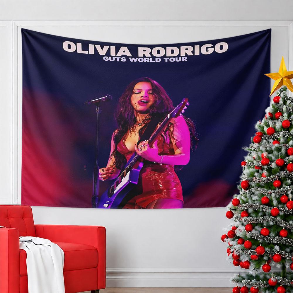 A pop artist performing with a guitar on stage in vibrant lighting. Patterned tapestry for bedroom and living room home decor