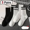 5 Pairs Black White Solid Color Mid Tube Socks Vertical Striped Suitable Both Men Women Sweat Absorbing Breathable Casual Socks