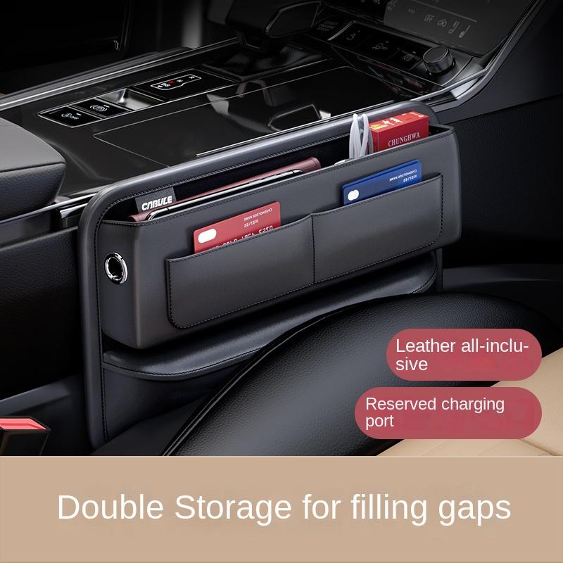 Ящик для хранения с центральным управлением швом автомобиля и несколькими отделениями. Сумка для хранения водителя и пассажира. Автомобильное хранилище.