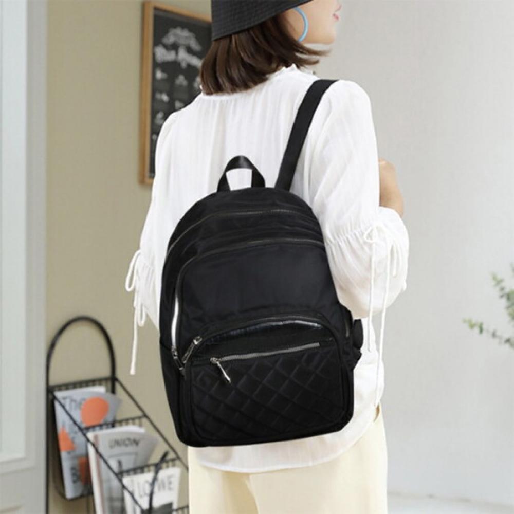 New Arrivals Open Run Quilted Diamond Mini Backpack