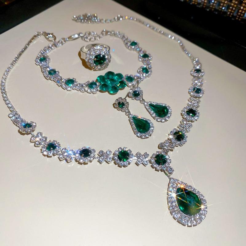 Diamond water drop flower bracelet ring earrings necklace four-piece set court style collarbone chain light luxury high-end jewelry