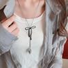 Bohemian Ethnic Distressed Bow Metal Necklace with Versatile Long Round Pendant 2025