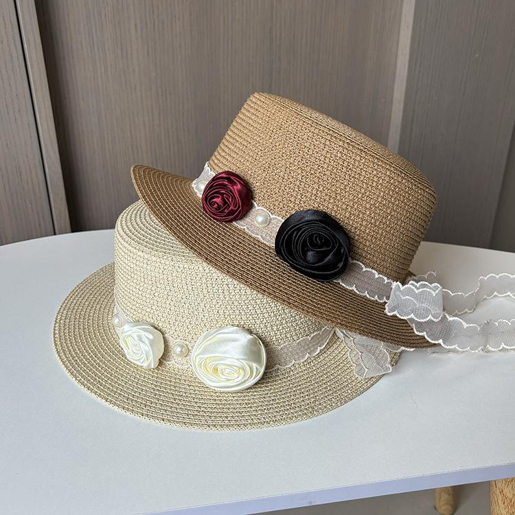 Pastoral streamer flower straw hat women's summer seaside vacation sun hat French flat top top hat sun hat