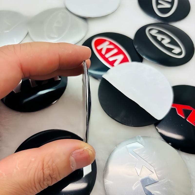 COZN3 4Pcs Car Tire Wheel Hub Center Cover Badge Sticker For Kia Sportage Carnival Seltos Sorento Rio Borrego Ceed Forte K3 K5 EV3 EV6